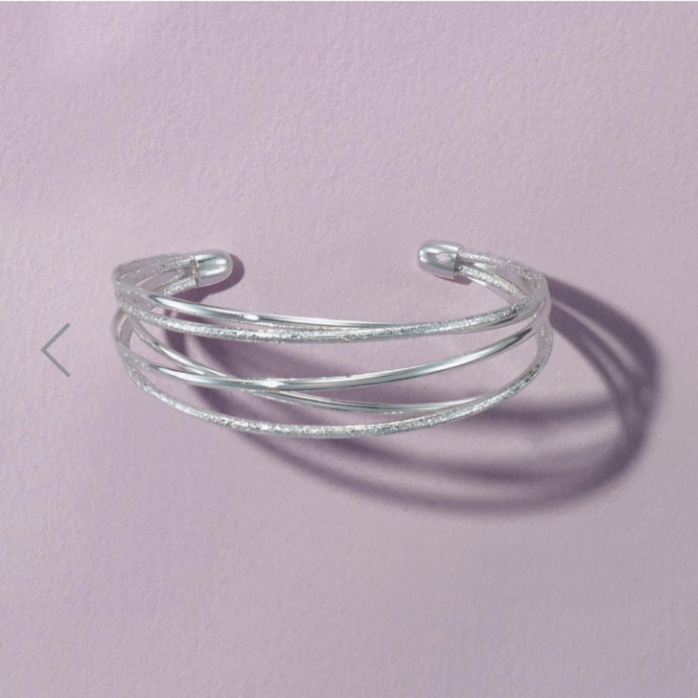 Shimmering silver tone cuff bracelet